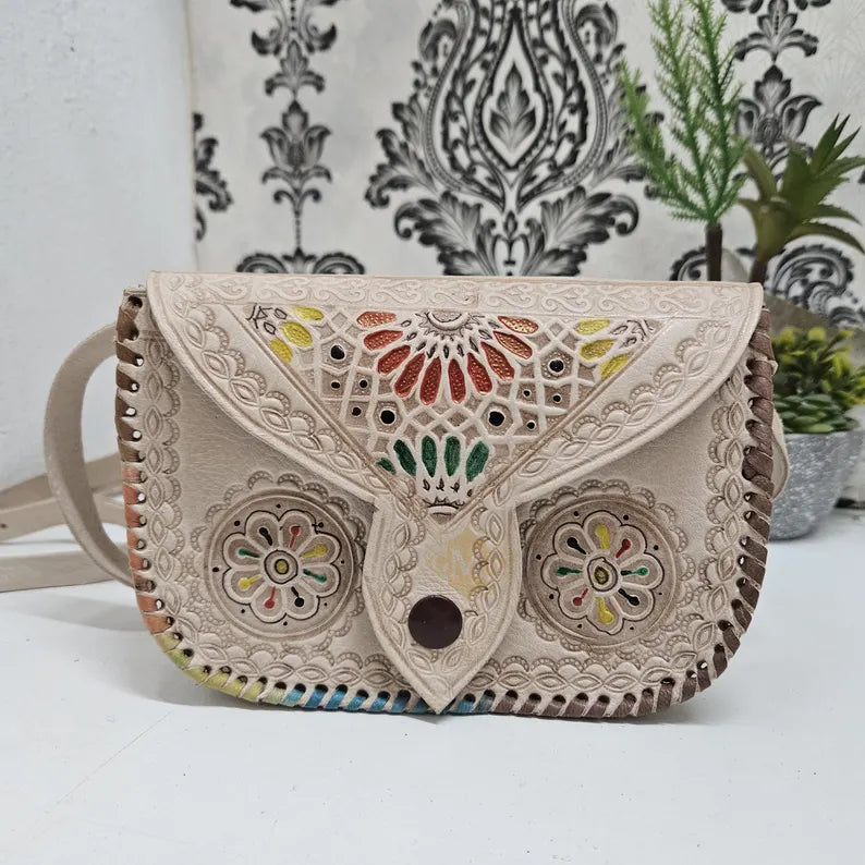 handcrafted leather shoulder bag with Moroccan patterns